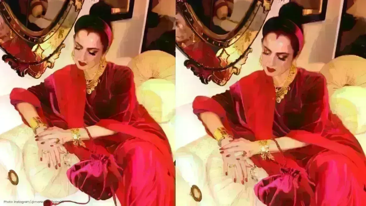 Rekha Stuns in Regal Burgundy Velvet Saree Look This Christmas